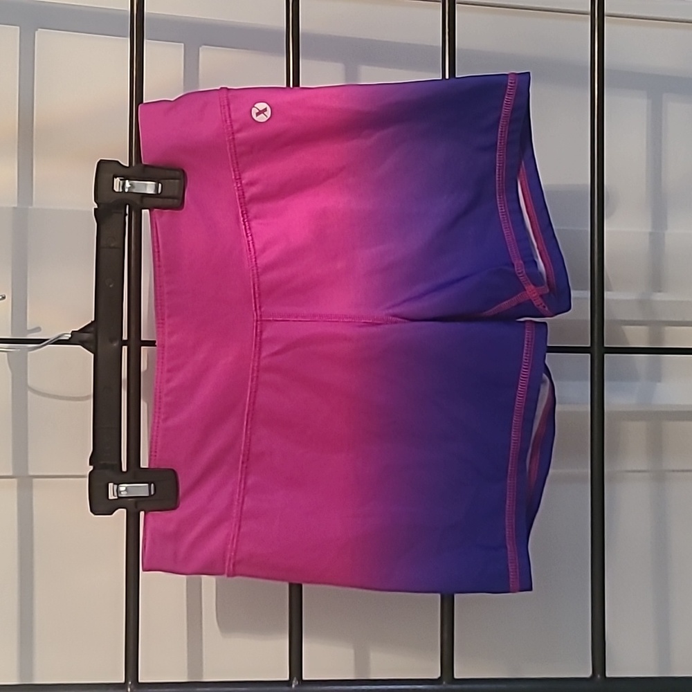 Girl's pink and purple spandex shorts